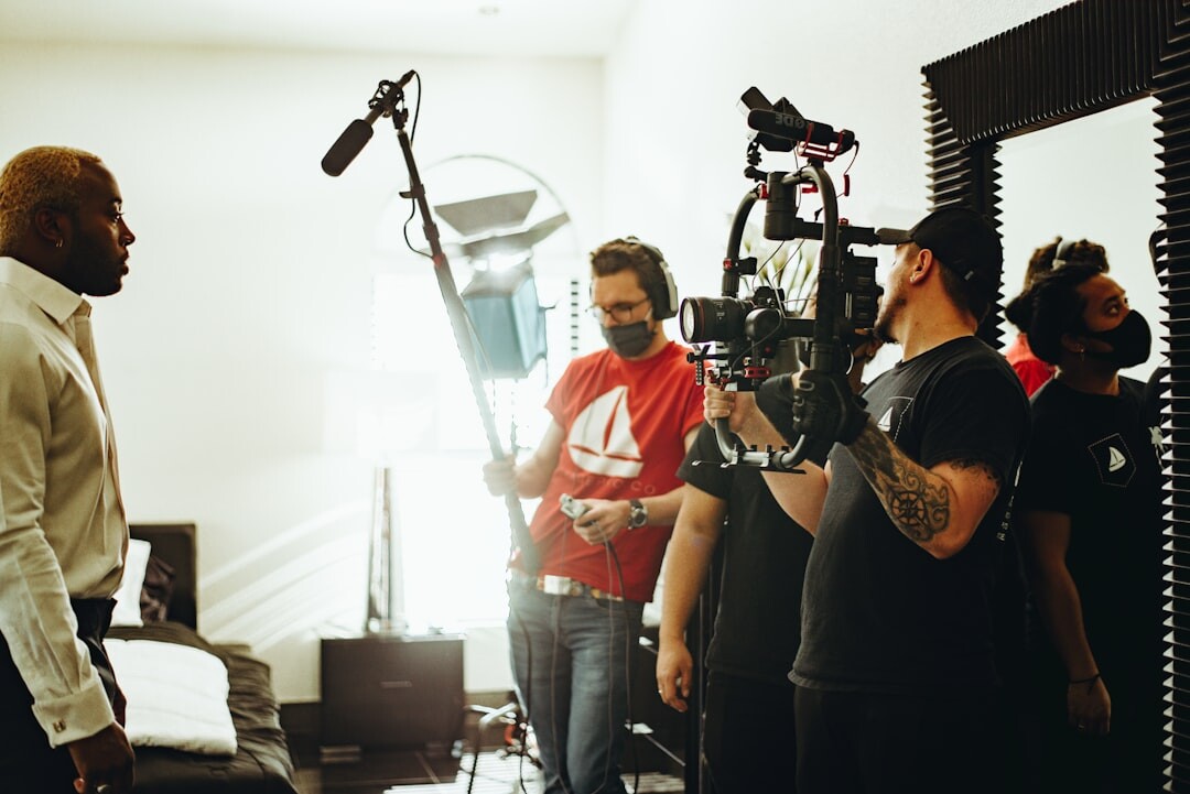 Media training session with instructor and broadcast students learning on-air techniques