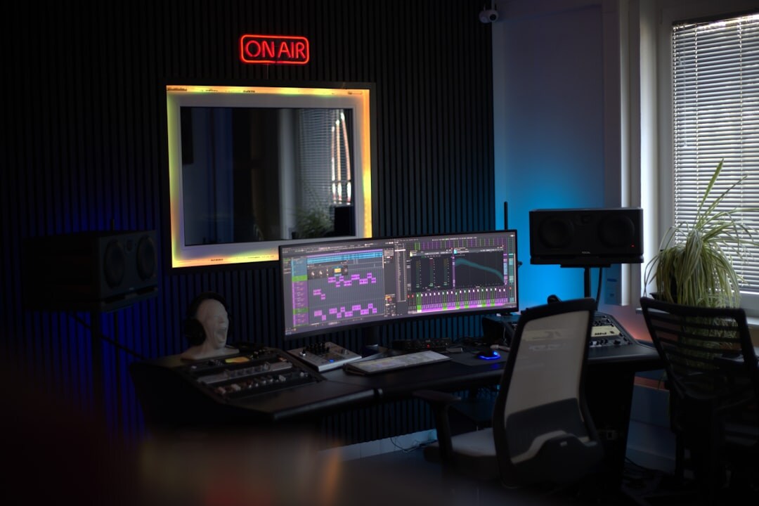 Broadcast zone planning with technical diagrams and studio floor plans on a monitor