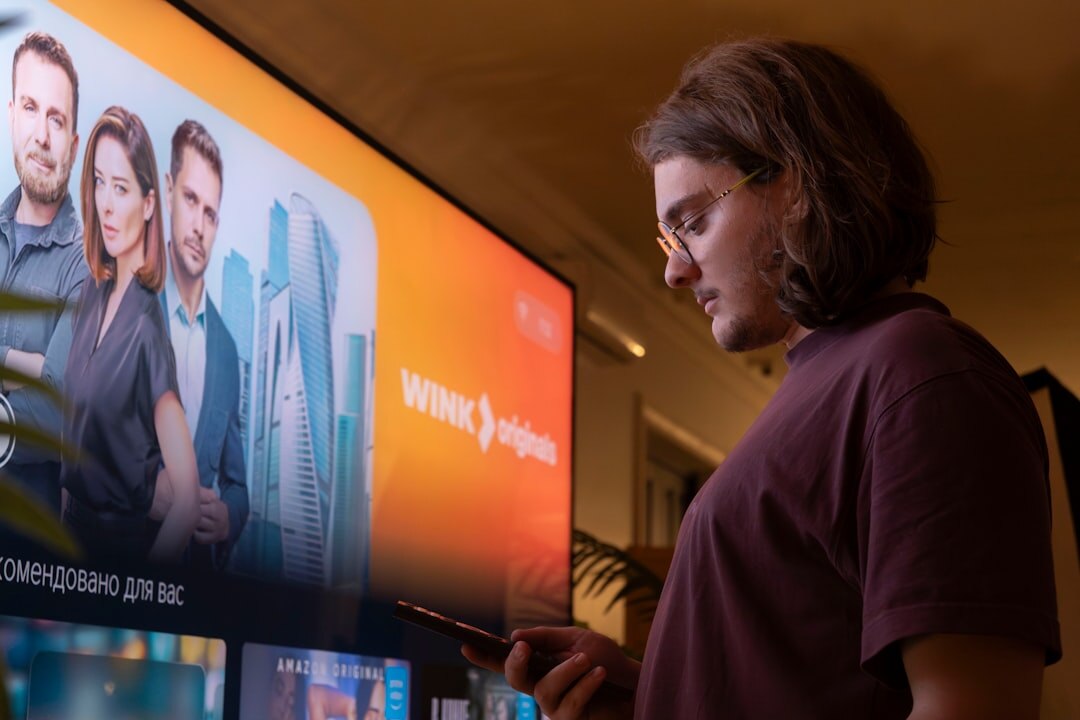 Director reviewing multi-camera strategy on broadcast monitors in control room
